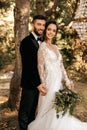 Young wedding couple smiling and looking at the camera Royalty Free Stock Photo