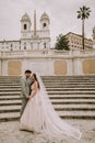 Young wedding couple on Spanish stairs in Rome Royalty Free Stock Photo