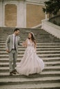 Young wedding couple on Spanish stairs in Rome Royalty Free Stock Photo