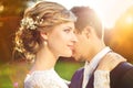 Young wedding couple on summer meadow Royalty Free Stock Photo