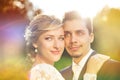 Young wedding couple on summer meadow Royalty Free Stock Photo