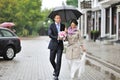 Young wedding couple walking in an old town Royalty Free Stock Photo