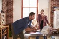 Young white couple using laptop computer in their kitchen Royalty Free Stock Photo