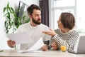 Young white couple working together with laptop Royalty Free Stock Photo