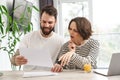 Young white couple working together with laptop Royalty Free Stock Photo