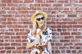 Caucasian Millennial Eats an Ice Cream Cone on a Sunny Day with Shades and a Fedora Hat Happy Smiling Royalty Free Stock Photo