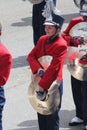 Young white girl in a marching band in the Cherry Blossom Festival in Macon, GA