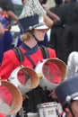 Young white male quad drum player in a marching band in the Cherry Blossom Festival in Macon, GA Royalty Free Stock Photo