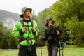 Young ?ouple hiking in mountain forest