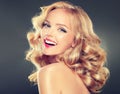 Young wide smiling blonde model. Royalty Free Stock Photo