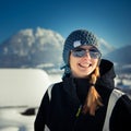 Young winter girl with cap and sunglasses Royalty Free Stock Photo
