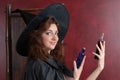 Young witch with potions Royalty Free Stock Photo