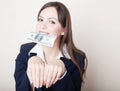 Young woman with 100 dollars in her mouth Royalty Free Stock Photo