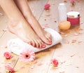 A young woman adding cream to her beautiful legs Royalty Free Stock Photo