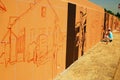 Painting a mural along Interstate 35 in Denton, Texas