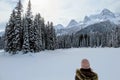 A young woman admiring the snowy views of Island Lake in Fernie, British Columbia, Canada. Royalty Free Stock Photo