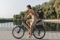 Young woman against nature background with bike Royalty Free Stock Photo