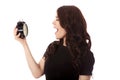 Young woman with alarmclock, isolated. Royalty Free Stock Photo