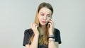 Young woman angry, cry, confused, sad, nervous, upset, stress and thinking with her mobile phone, beautiful young girl Royalty Free Stock Photo