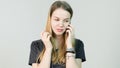 Young woman angry, cry, confused, sad, nervous, upset, stress and thinking with her mobile phone, beautiful young girl Royalty Free Stock Photo