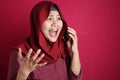 Young Woman Angry by Phone Call, Screaming on Phone Royalty Free Stock Photo