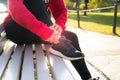 Young woman ankle injury while walking in the park Royalty Free Stock Photo