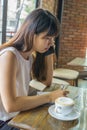 Young woman answering phone call Royalty Free Stock Photo