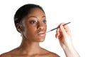 Young woman applying a lip brush Royalty Free Stock Photo