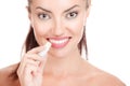 Woman applying lips balsam, lip balm smiling happy