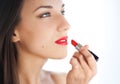 Young woman applying lipstick Royalty Free Stock Photo