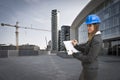 Young woman architect in the construction site Royalty Free Stock Photo