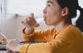 young woman Asian girl drinking clean water from glass is happy in morning, Healthy Liquid Royalty Free Stock Photo