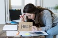 Young woman asking for help suffering stress doing domestic accounting paperwork bills Royalty Free Stock Photo