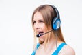 Young woman assistant operator shouting in headset