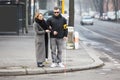 Woman Assisting Blind Man On Street Royalty Free Stock Photo