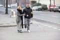 Woman Assisting Blind Man On Street Royalty Free Stock Photo