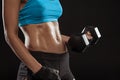 Young woman athlet muscle body portrait in gym Royalty Free Stock Photo