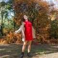 Young woman in autumn forest Royalty Free Stock Photo