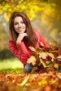 Young woman with autumn leaves Royalty Free Stock Photo