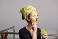 Young woman with an avocado facial mask Royalty Free Stock Photo