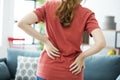 Young woman with back pain Royalty Free Stock Photo