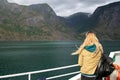 Young woman with a backpack on deck of the ferry Royalty Free Stock Photo