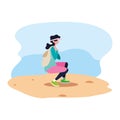 young woman with backpack walking sand