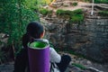 Young woman backpacker enjoy the view at mountain peak Royalty Free Stock Photo