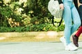 Young woman with bag walking in the park Royalty Free Stock Photo