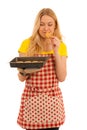 Young woman baking cookies isolated over white background Royalty Free Stock Photo