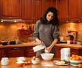 Young woman baking at home Royalty Free Stock Photo