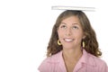 Young woman balancing book on head