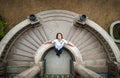 Young woman on the balcony of the old palace Royalty Free Stock Photo