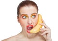 Young woman with banana